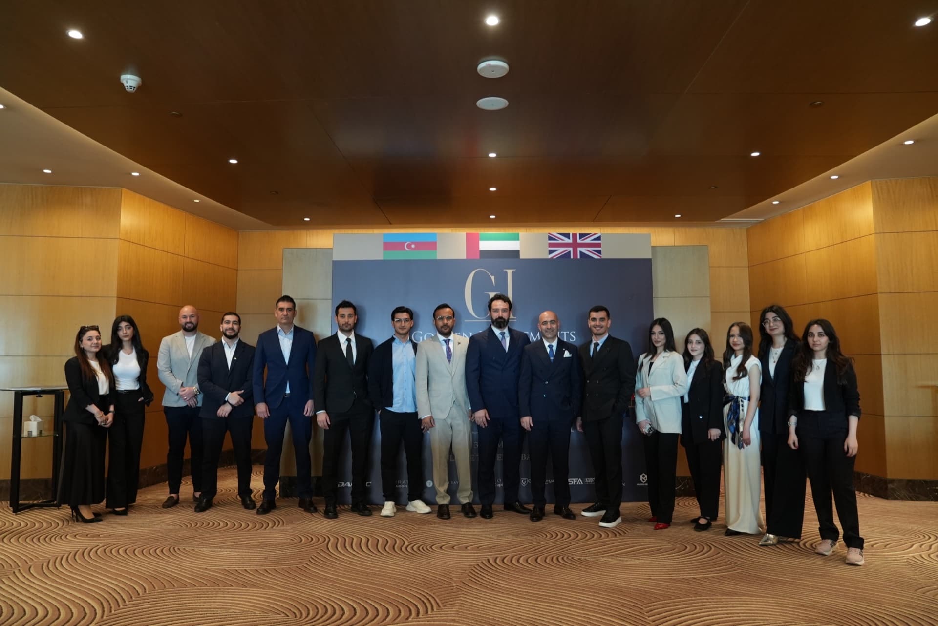 The Baku Property Show team beneath the Azerbaijan, UAE and UK flags