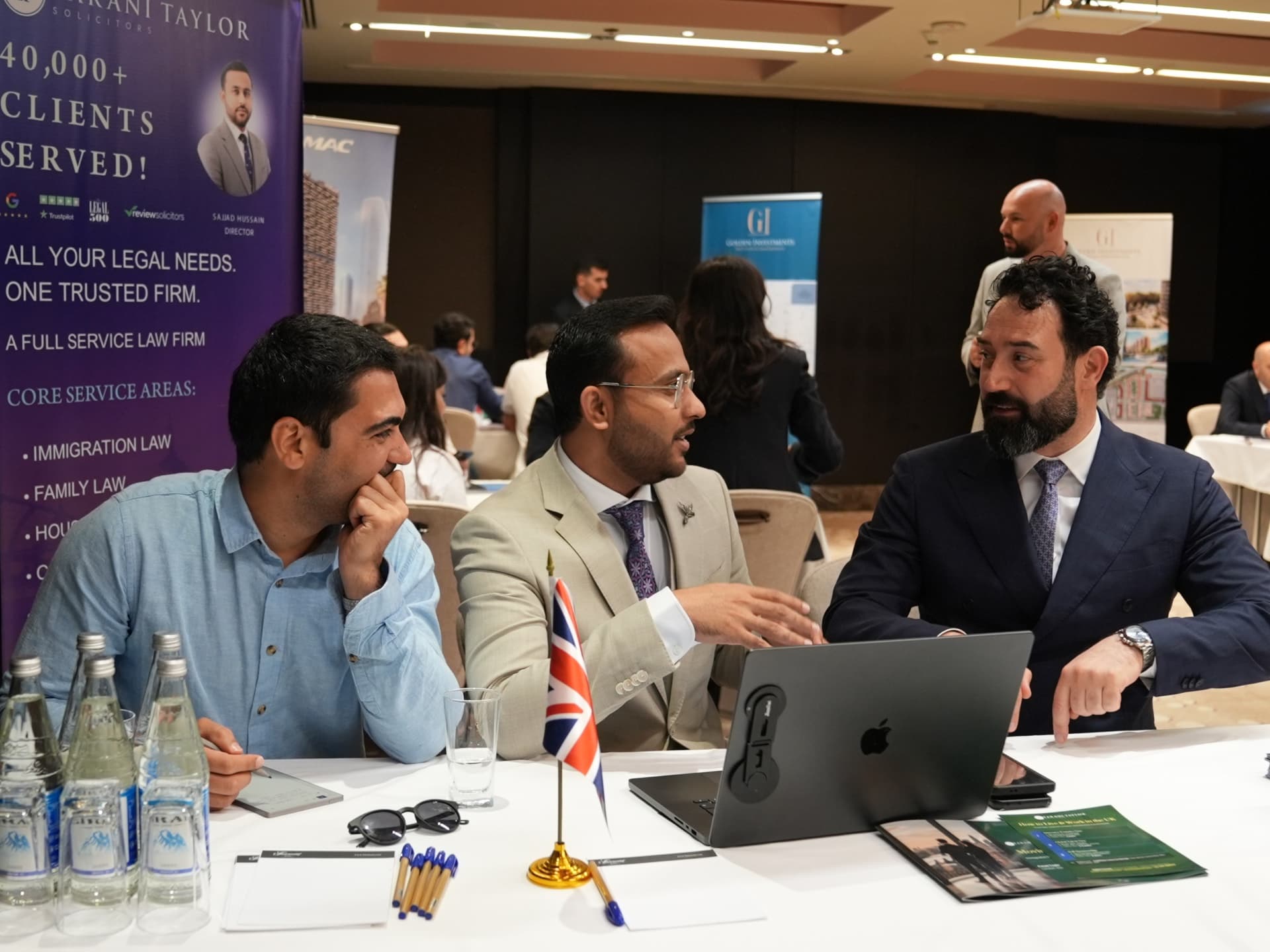 Sajjad Hussain discussing UK property with delegates in Baku
